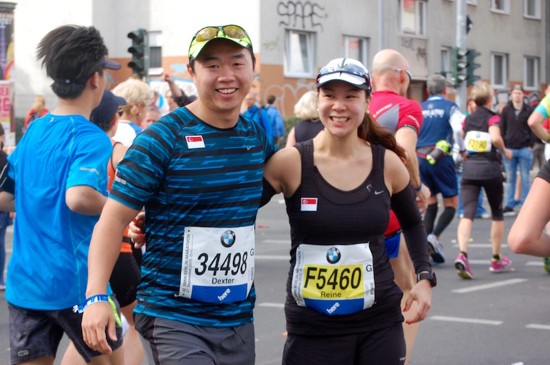 Reine (6 months pregnant) running the marathon with her hubby